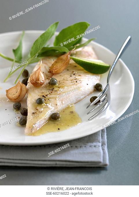 John Dory with caper butter and confit garlic cloves