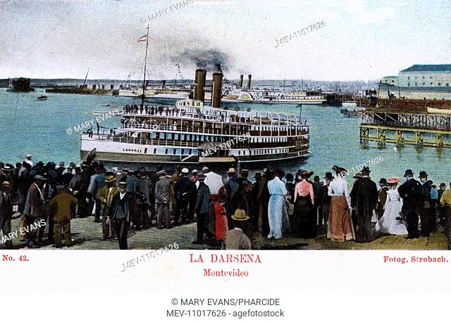 Docks at Montevideo, Uruguay, South America, with people looking at the steamship Londres from the quayside