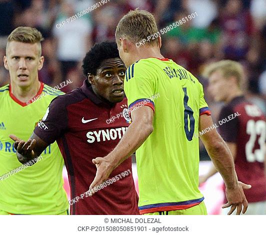 Tiemoko Konate, of Sparta, left to right, and Aleksei Berezutski of CSKA Moscow discuss during the third qualifying round of the Champions League return match...