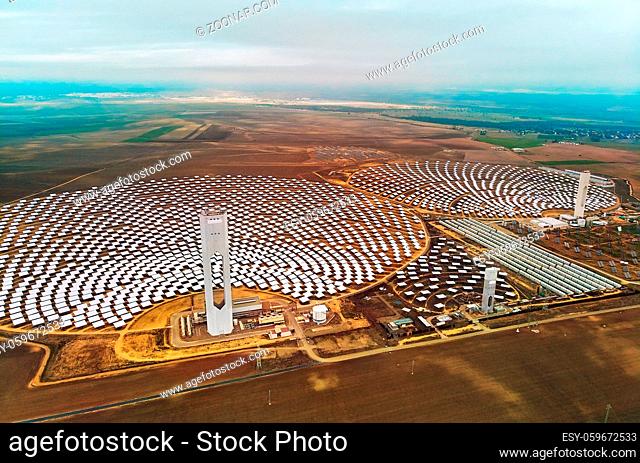 Image drone point of view Gemasolar Concentrated solar power plant CSP circle shape, system generate solar power using mirrors lenses to concentrate large area...