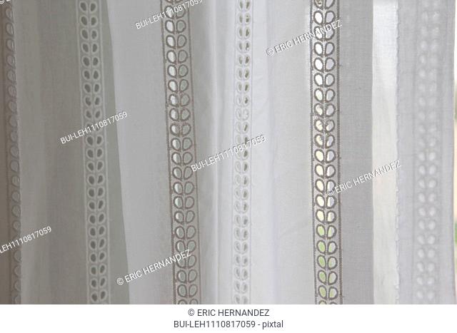 Detail shot of a white curtain