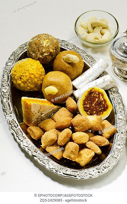 Shankarpali, Chakali, Laddu, Chivda, Namkeen and Anarsa. Typical Diwali snack items, Maharashtra, India