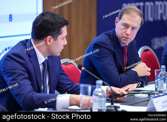 RUSSIA, KALININGRAD - DECEMBER 1, 2023: Kaliningrad Region Governor Anton Alikhanov (L) and Russia's Industry and Trade Minister Denis Manturov attend a meeting...