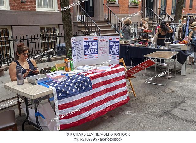 Voter registration table at the Jane Street Block Association Flea Market in the New York neighborhood of Greenwich Village on Saturday, June 2, 2018