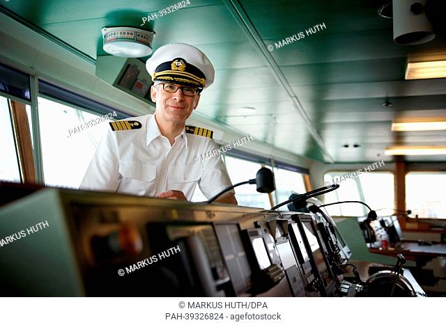 Elmar Muehlebach, captain of the cruise ship 'Deutschland, ' stands on the Deutschland's bridge at the cruise ship in the port of Hamburg, Germany, 02 May 2013
