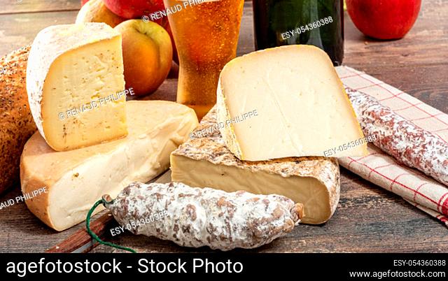 cheeses and Tomme de Savoie with beer, French cheese Savoy, the french Alps France