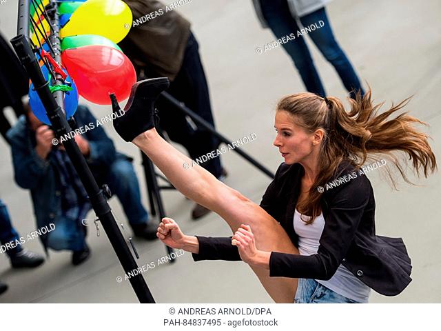 Taekwondo athelete Jaclyn Hagemann sets up with 37 Ballons for the 'High-Heel-Ballon-Kick' in Frankfurt, Germany, 17 October 2016