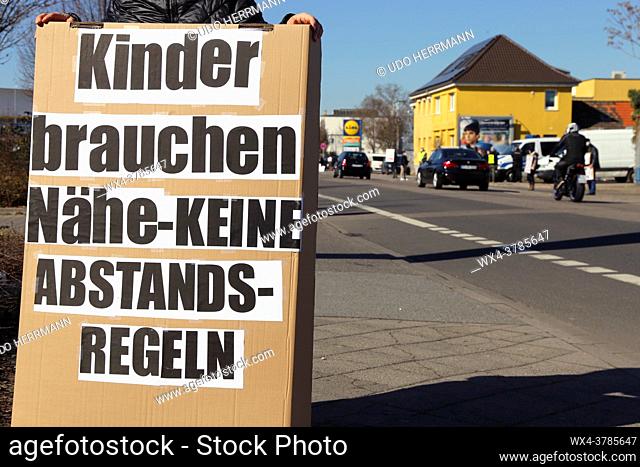 Rally against Corona measures, Germany: Demonstrators express their criticism of corona policies with an approved sign action in Industriestrasse in...