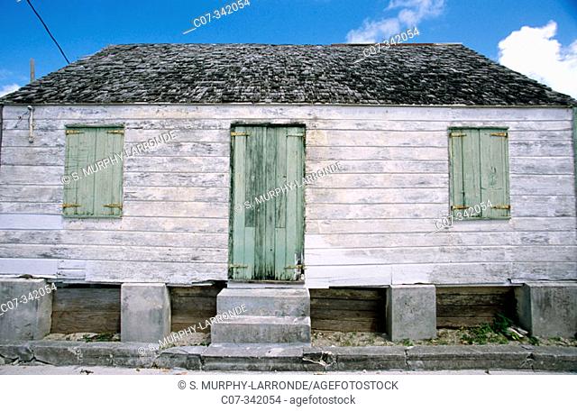 this little unrestored saltbox house is typical of the 19th century New England-style architecture found in the Abaco chain. Bahamas