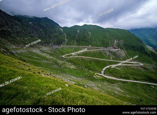 Aerial view with Transfagarasan Road (DN7C also known as CeauÈ. escu's Folly) crossing the southern section of the Carpathian Mountains in Romania