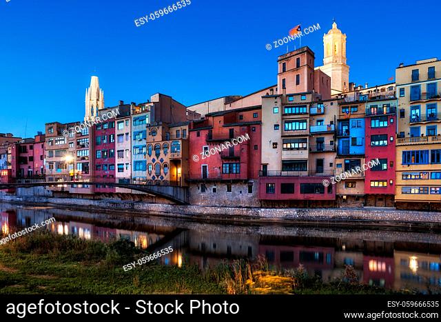 City of Girona Old Town riverside houses at dusk in Catalonia, Spain