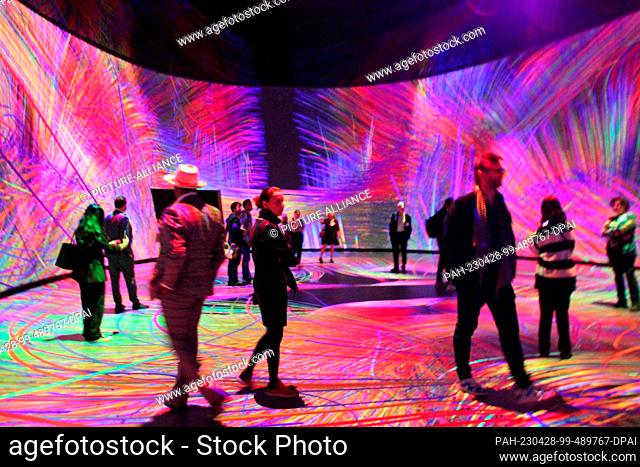 26 April 2023, USA, New York: Visitors in an exhibition in the extension to the American Museum of Natural History, the ""Richard Gilder Center for Science