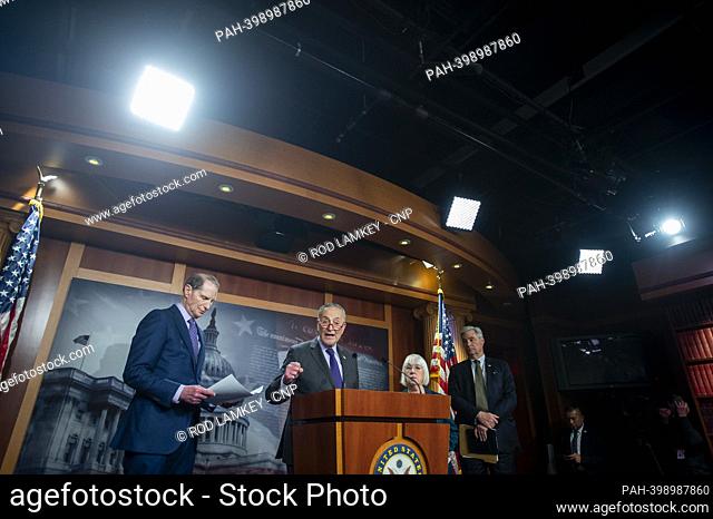 United States Senate Majority Leader Chuck Schumer (Democrat of New York), second from left, is joined by United States Senator Ron Wyden (Democrat of Oregon)