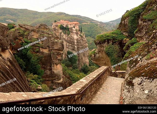 Amazing view from the stairs leading up to the Holy Monastery of Great Meteoron onto the Monastery of Varlaam, Meteora, Greece 2021