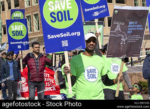 Royal Oak, Michigan USA - 23 April 2022 - The Oakland County (Michigan) Climate Campaign holds a march and rally urging local communities to take action to...