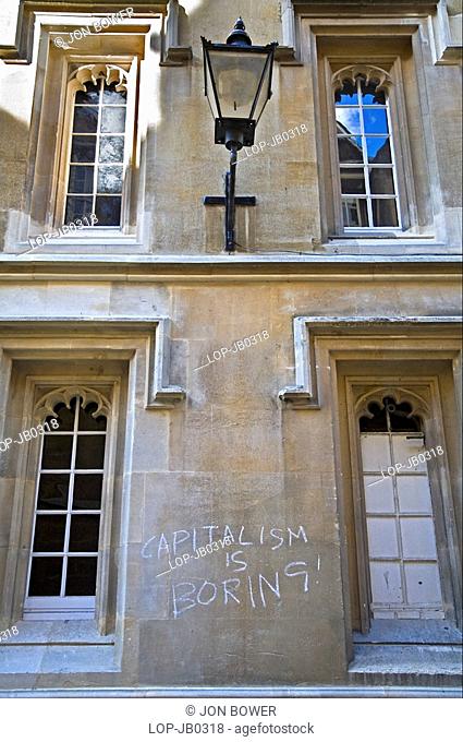 England, Oxfordshire, Oxford, Pungent graffiti on walls of Oxford College. The word 'graffiti' is the plural of 'graffito' and originates from the Italian word...