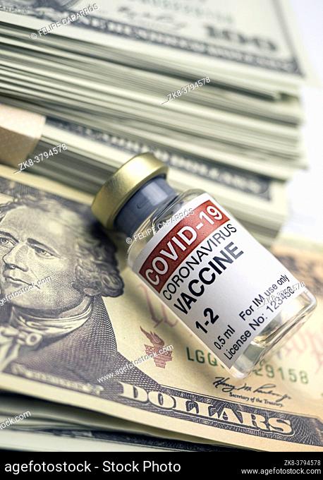 Covid-19 coronavirus vaccine for vaccination plan together with banknotes, conceptual image
