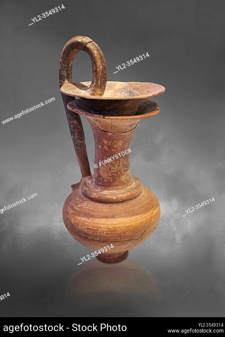 Minoan rhython jug with single handlel, Gournia 1600-1450 BC; Heraklion Archaeological Museum, grey background