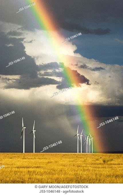 Wind turbines and dramatic rainbow near sunset, Judith Gap, Montana