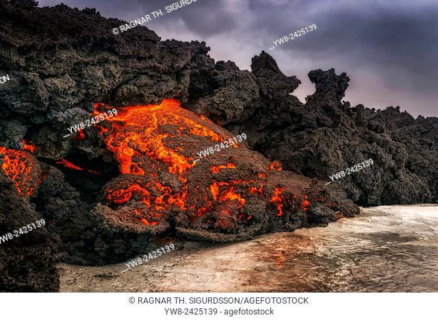 Glowing Lava flowing, Holuhraun Fissure Eruption, Bardarbunga Volcano, Iceland. August 29, 2014 a fissure eruption started in Holuhraun at the northern end of a...
