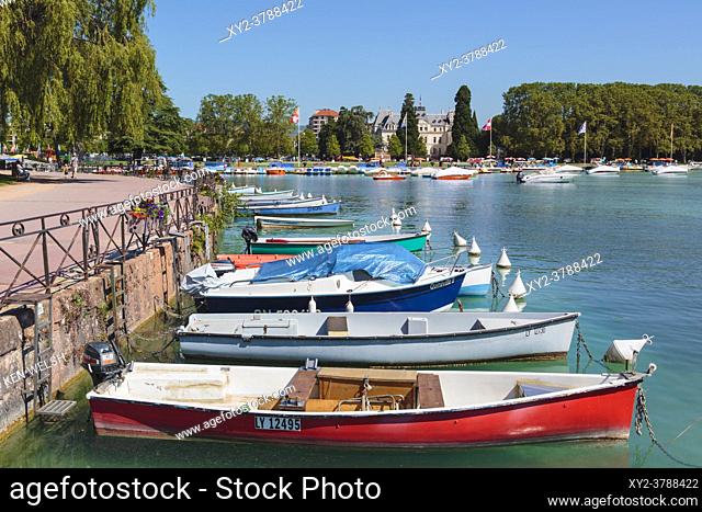 Annecy, Haute-Savoie department, Rhone-Alpes, France. Boats on Lake Annecy, on the shores of the Jardins de l'Europe