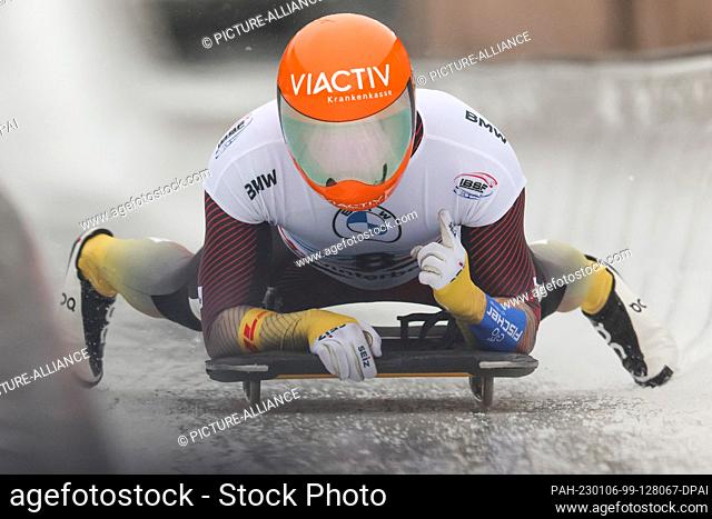 06 January 2023, North Rhine-Westphalia, Winterberg: Skeleton: World Cup, single, men, 2nd run: Christopher Grotheer from Germany is happy in the track after...