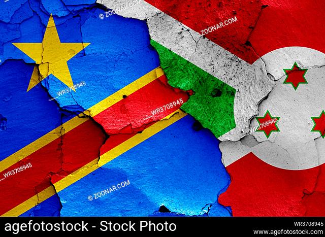 flags of DR Congo and Burundi painted on cracked wall