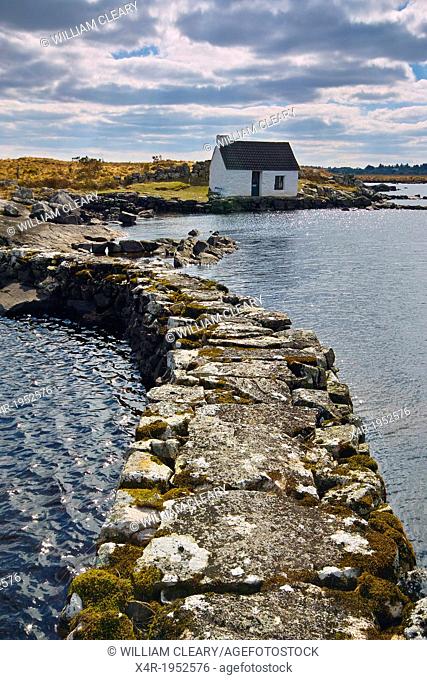 Boatkeepers office at the shore of a small lake in Connemara, near Maams Cross, County Galway, Ireland