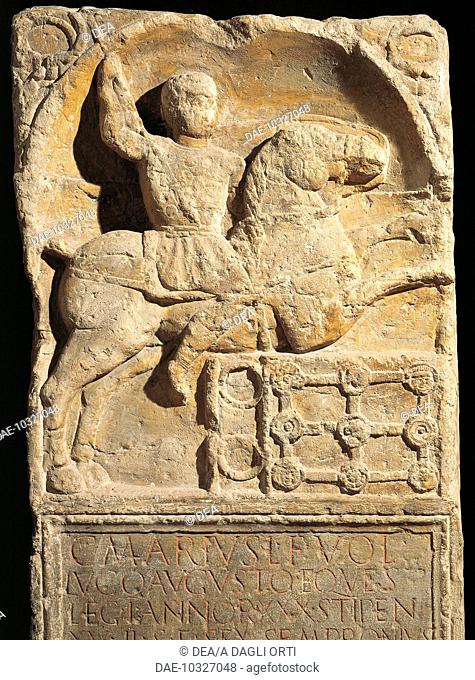 Roman civilization. A knight from the Caio Mario First Legion's stele, with shield, lance and ornamentation: nine phalera and two armilla