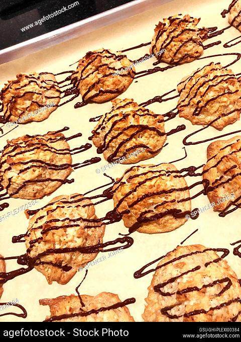 Coconut Macaroons with Chocolate Drizzle on Baking Sheet