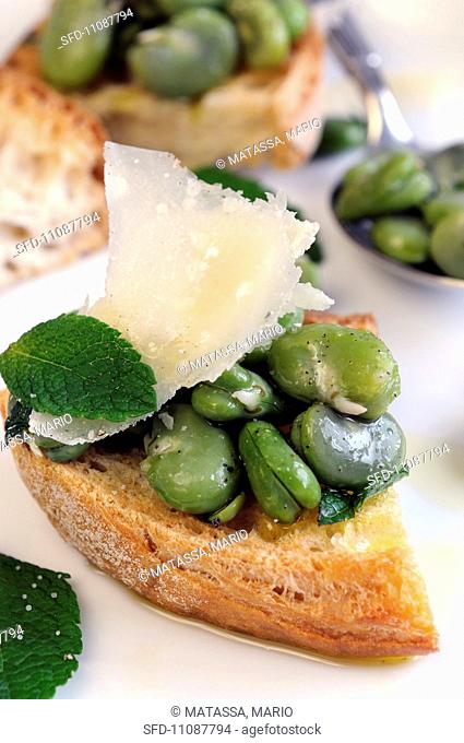 Bruschetta con le fave toasted bread topped with broad beans, Italy