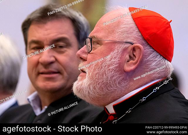 12 July 2022, Bavaria, Munich: Cardinal Reinhard Marx (r), Archbishop of Munich and Freising, and Markus Söder (CSU), Minister President of Bavaria