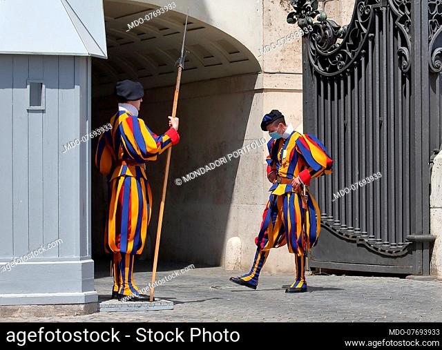 Angelus. The Pontifical Swiss Guards on duty at the Arco delle Campane wear masks to protect themselves from the coronavirus