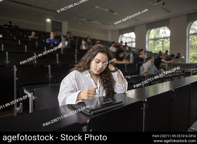 21 June 2023, Lower Saxony, Hanover: Adela Poteri sits in the mathematics lecture at Leibniz University in Hanover. The highly gifted 13-year-old actually goes...