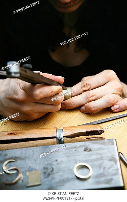 Goldsmith working on wedding rings
