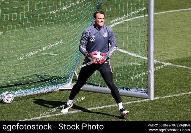 30 May 2021, Austria, Seefeld: Football, national team, training camp, training: Goalkeeper Manuel Neuer during training