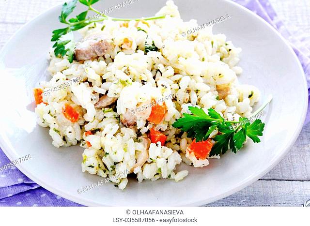 Arborio rice with cheese and vegetables, food closeup