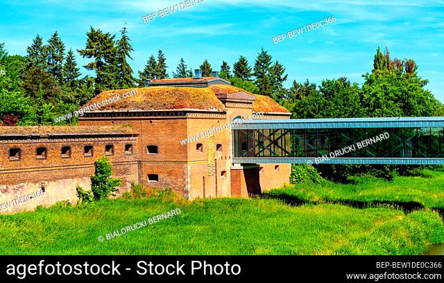 Poznan, Poland - June 6, 2015: Cathedral Sluice building as part of XIX Prussian stronghold on historic Ostrow Tumski island at Cybina river