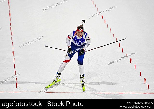 Czech biathlete Lucie Charvatova finishes the women's 7, 5-kilometer sprint race at Zhangjiakou National CC Skiing Centre, China, on February 11, 2022