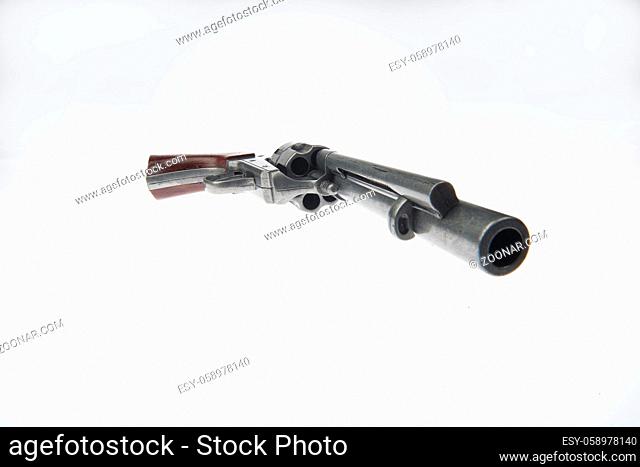 Old army revolver on an isolated studio background