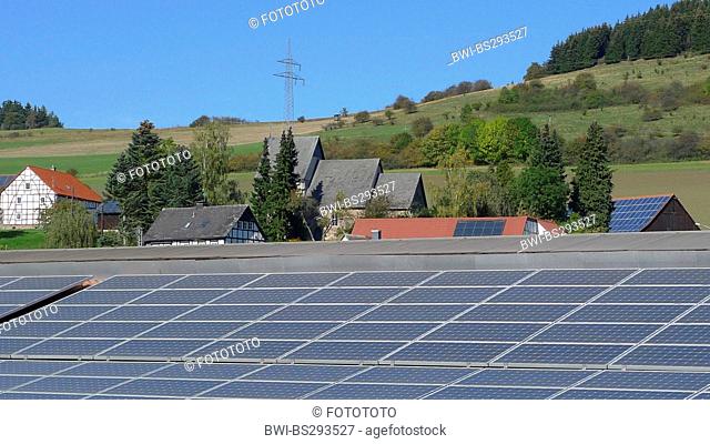 solar panels on the roof of a farm building, Germany