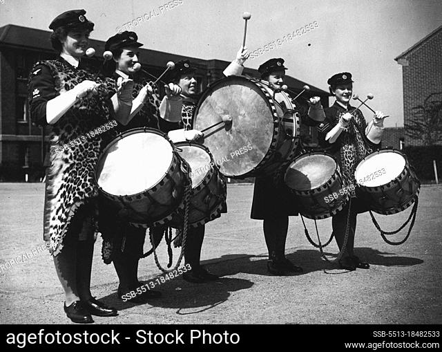 W.A.A.F. Band Rehearses For Victory Parade - The tenor and base drum section of the band in full regalia. Left to Right: L.A.C.W. I.J