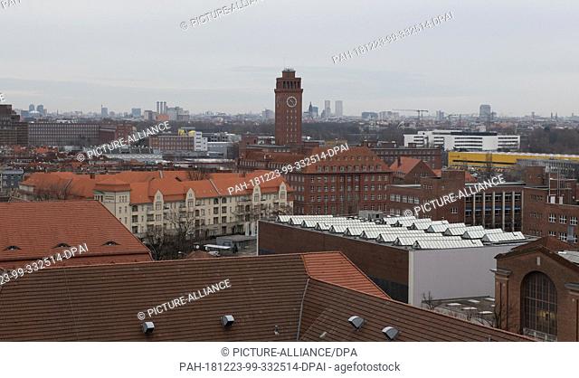 21 December 2018, Berlin: As a striking historical building, the Siemens Tower in Siemensstadt rises into the sky. The former landmark is surrounded by...