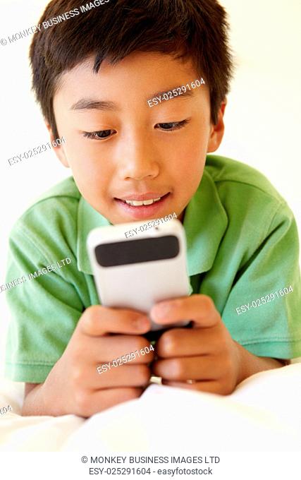 Young boy using smartphone