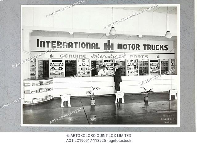 Photograph - International Harvester, Spare Parts Counter, Sydney, 1947, One of four black and white photographs attached to an album page