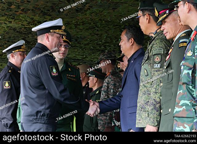 RUSSIA, PRIMORYE REGION - SEPTEMBER 26, 2023: Russian Pacific Fleet Commander Viktor Liina (L) greets members of foreign delegations attending the ADMM-plus...