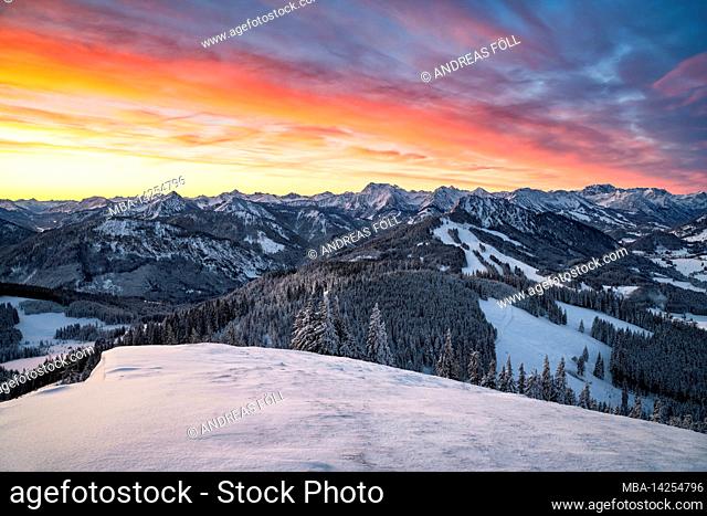 Beautiful morning red on a cold winter day in the Allgäu Alps. View from the Reuterwanne to the south to the Tannheimer mountains