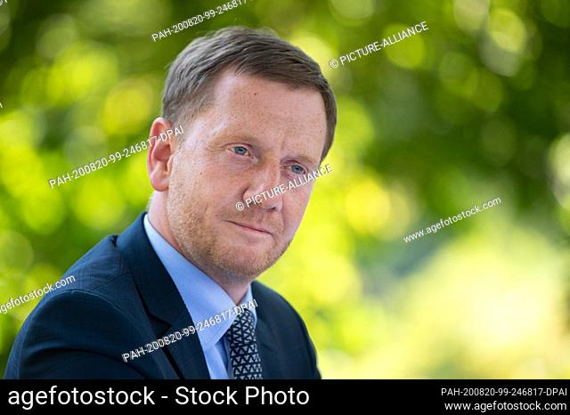 20 August 2020, Saxony, Bad Muskau: Michael Kretschmer (CDU), Prime Minister of Saxony, attends a press conference in the Fürst-Pückler-Park