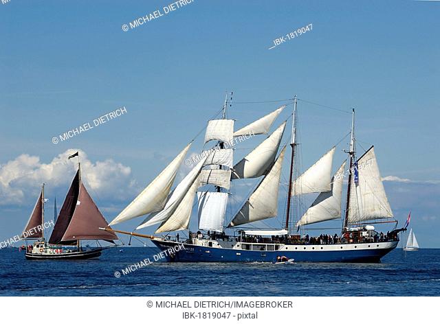 Meeting of a sail boat with a tall ship, three-masted barquentine, under full sail, Kieler Woche 2010, Schleswig-Holstein, Germany, Europe