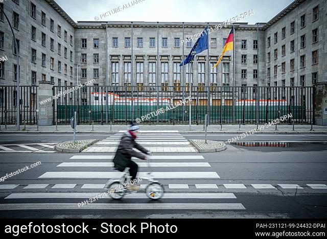 21 November 2023, Berlin: A cyclist rides past the Federal Ministry of Finance. The Ministry of Finance had blocked the commitment appropriations from the 2023...